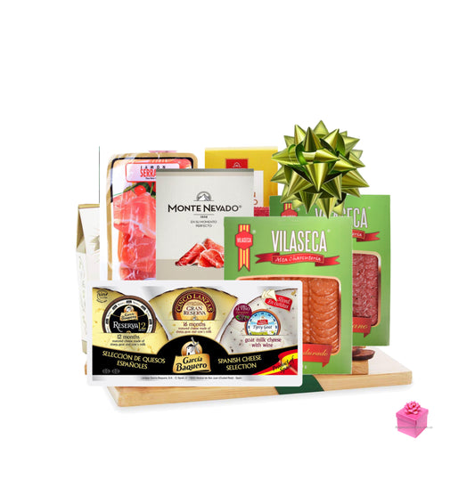 Ancheta de tabla de quesos, tapas, en la cual la base es precisamente la tabla.  Espectacular regalo temático para los amantes de los buenos quesos y jamones curados.