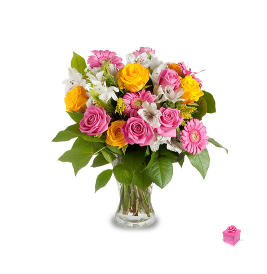 Maravilloso Bouquet de Flores primaverales, Rosas y Gerberas en florero de cristal a Colombia. Envía este maravilloso Bouquet de Gerberas y Rosas en florero a domicilio en cualquier parte de Colombia